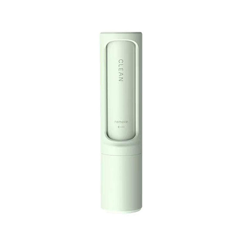 Fresh Sweep reusable pet hair brush in green, shown closed against a white background