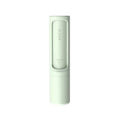 Fresh Sweep reusable pet hair brush in green, shown closed against a white background
