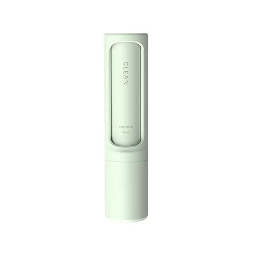 Fresh Sweep reusable pet hair brush in green, shown closed against a white background